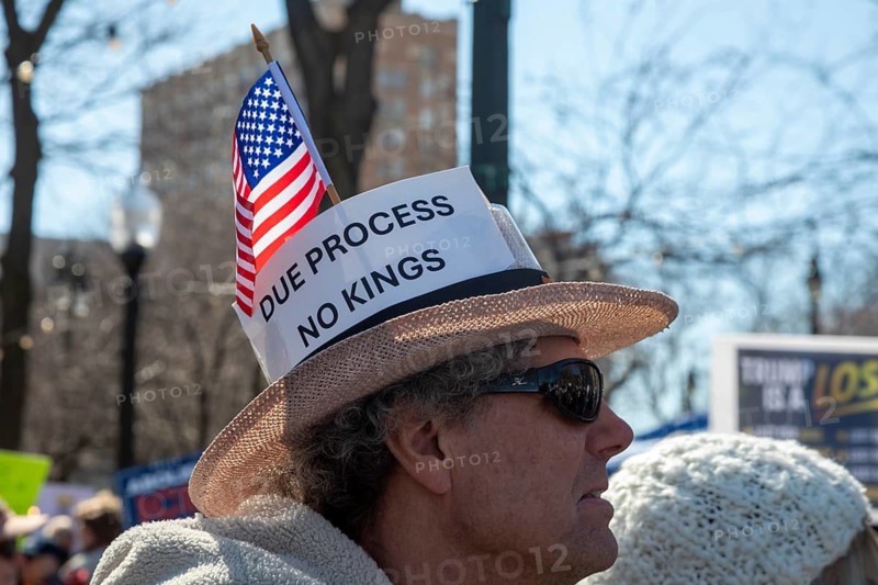 Detroit, Michigan USA - 28 March 2026 - People gathered at more than 100 'No Kings' rallies across Michigan. They were fighting to preserve democratic institutions, and protesting President Trump's actions against immigrants and getting the U.S. into a new foreign war