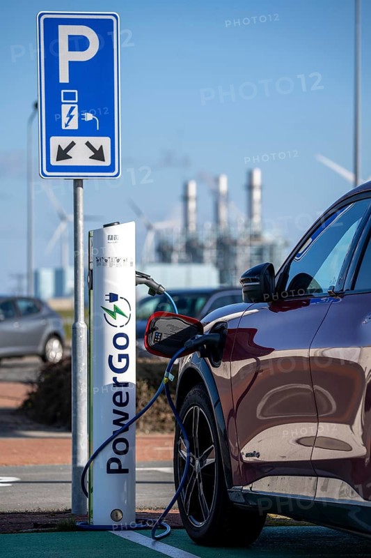 Electric car fast charging station, from the Dutch provider PowerGo, in the ferry harbour of Eemshaven, powered by renewable energy, Netherlands