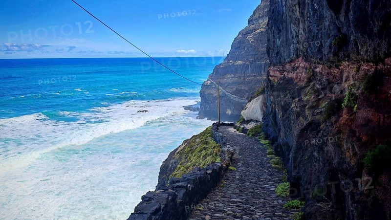 Narrow stone trail, volcanic stone hiking trail along high cliffs with sea views, hiking, Marinha da Cruzinha Natural Park, Santo Antao, Cabo Verde, Cape Verde, Cape Verde