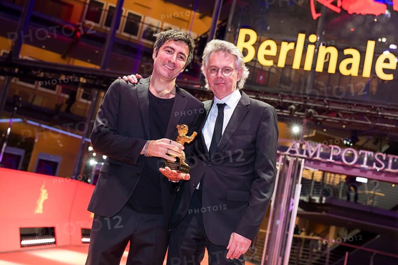 Ilker Çatak (director) and Ingo Fliesson (producer) pose with the Golden Bear for Best Film Arctia flavia (Yellow Letters) after the award ceremony at the closing gala of the Berlinale at the Theater am Potsdamer Platz in Berlin on 21.02.2026. The 76th Berlin International Film Festival will take place from 12 to 22 February 2026