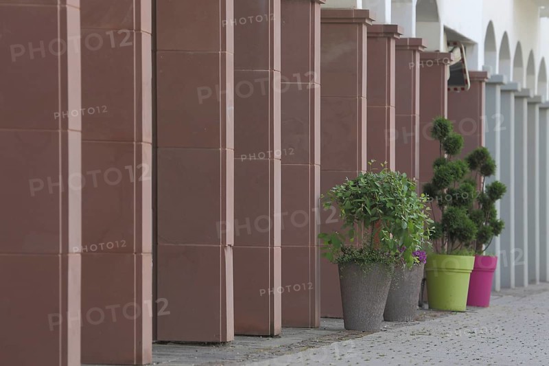 Colonnade with red pillars, Dr.-Winfried-Stephan-Platz, Kelkheim, Hesse, Germany