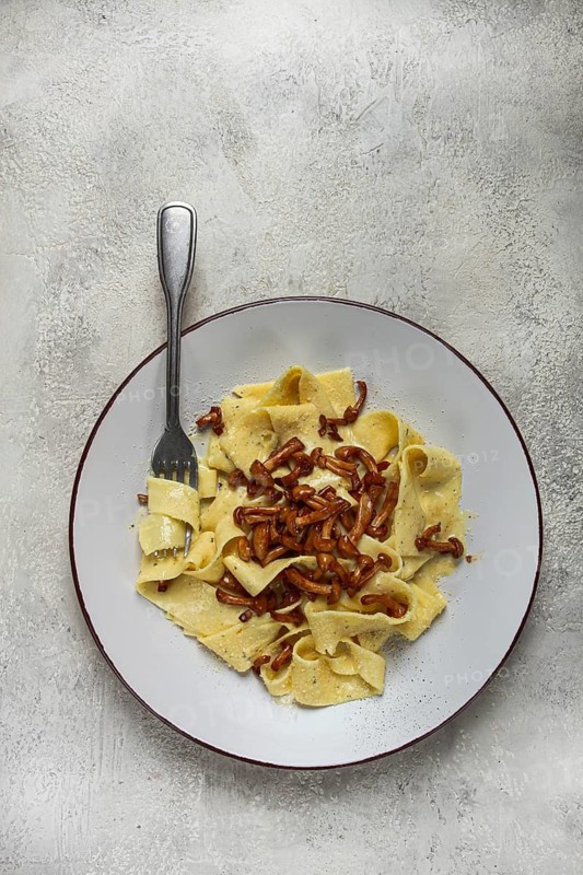 Pasta papardelle, in creamy garlic sauce, with mushrooms, traditional Italian cuisine, pasta carbonara, homemade, no people