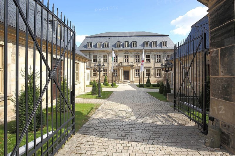 Courtyard entrance with metal gate to the cathedral dechanei, courtyard, Halberstadt, Harz, Saxony-Anhalt, Germany