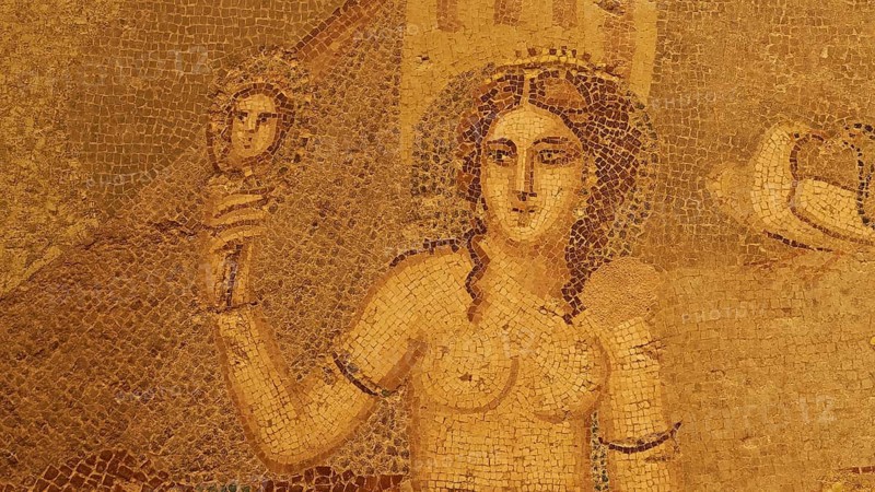 Ancient mosaic depicting the goddess Aphrodite with a mirror in decorative hair in front of a patterned wall, Patras Archaeological Museum, Patras, Peloponnese, Greece