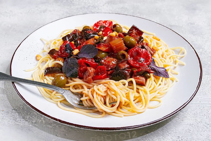 Spaghetti with Sicilian caponata, vegetable stew, Italian cuisine, homemade, no people