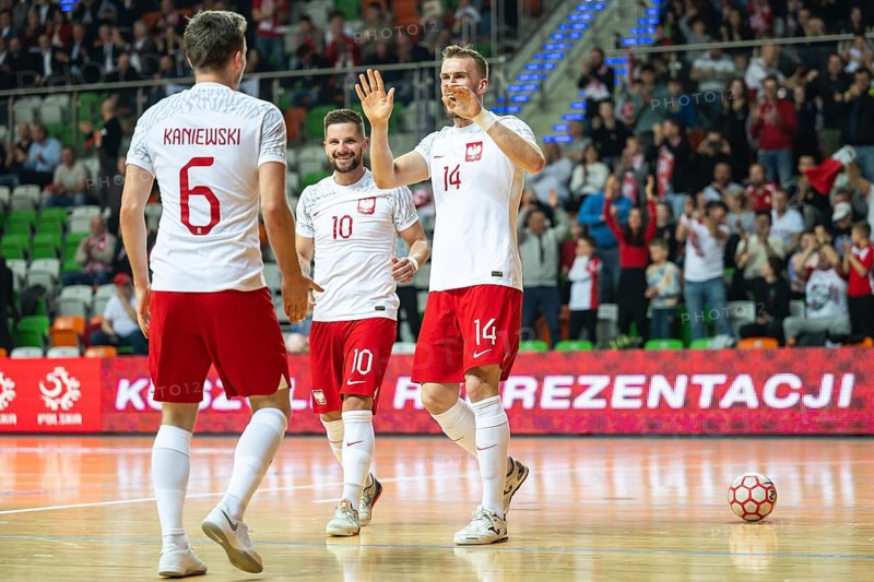 LUBIN, POLAND - MARCH 12, 2025: Futsal match European Championship qualifiers Poland - Moldova 3:0. Joy Pawel Kaniewski (6) Sebastian Leszczak (10) Michal Marek (14) team of Poland after scoring goal