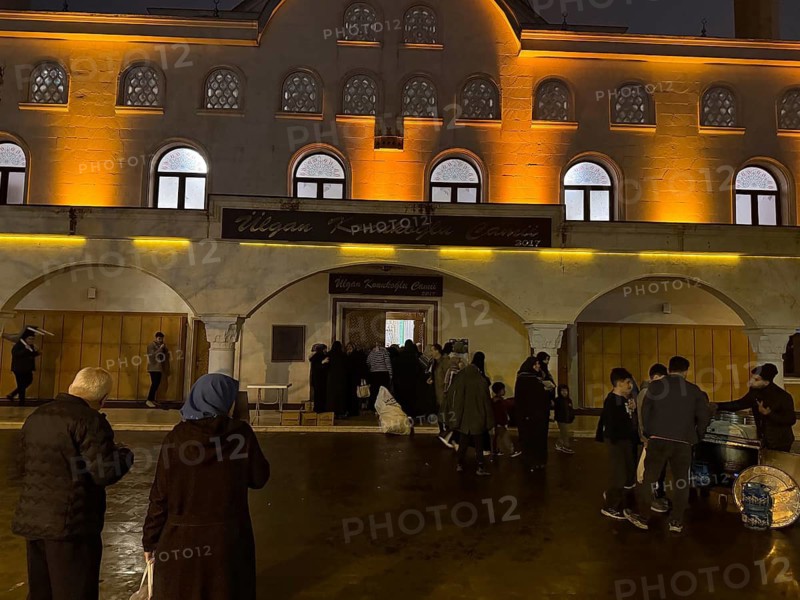 Dozens of Muslims stand in a long queue to view a sacred piece of the Kaaba curtain (Kiswa) while observing Laylat al-Qadr with prayers and supplications during the holy month of Ramadan in Gaziantep, Turkey on March 16, 2026, Gaziantep, Turkey