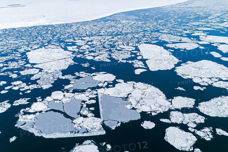 Ice broken after a ship passed over the frozen St. Lawrence River, Region of Center Quebec, Province of Quebec, Canada