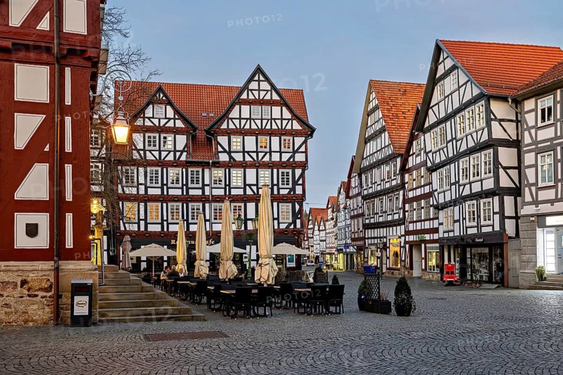 Quiet square with half-timbered houses and cafés as the evening sets in, The old town centre of Melsungen