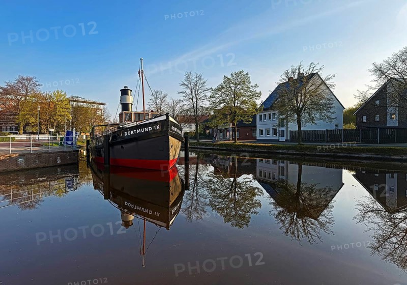 Open air shipping museum on the main canal with the museum ship Dortmund IX, Papenburg, Fehn-Kolonie, Emsland, Lower Saxony, Germany