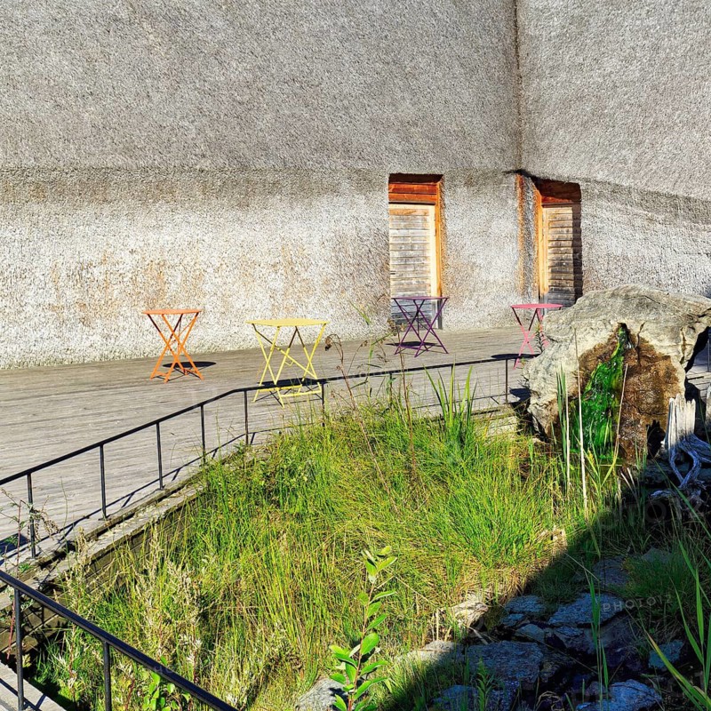 Different coloured folding tables, courtyard at Naturum Takern Visitor Center, modern architecture, architect Gert Wingårdh, Vadstena, Östergötland, Sweden