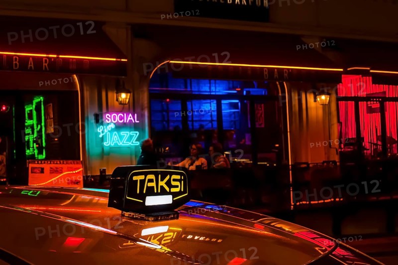 Istanbul, Turkey. October 28th 2019 A yellow Turkish taxi sign outside a popular Jazz Bar, part of the nightlife around Taksim square Istanbul, Beyoglu Turkey