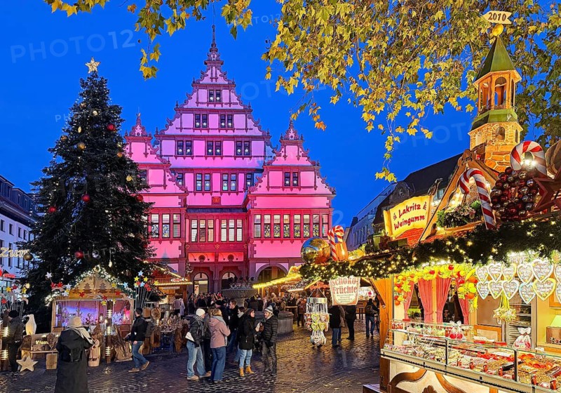 Weser Renaissance style town hall with Christmas market on Town Hall Square, Rathausplatz, Rathausplatz in the evening, Paderborn, North Rhine-Westphalia, Germany