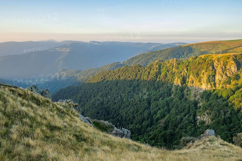 The first rays of sunshine at Mount Hohneck in the Vosges Mountains, France