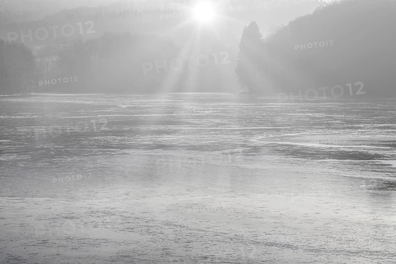 Frozen lake, structures of the water surface