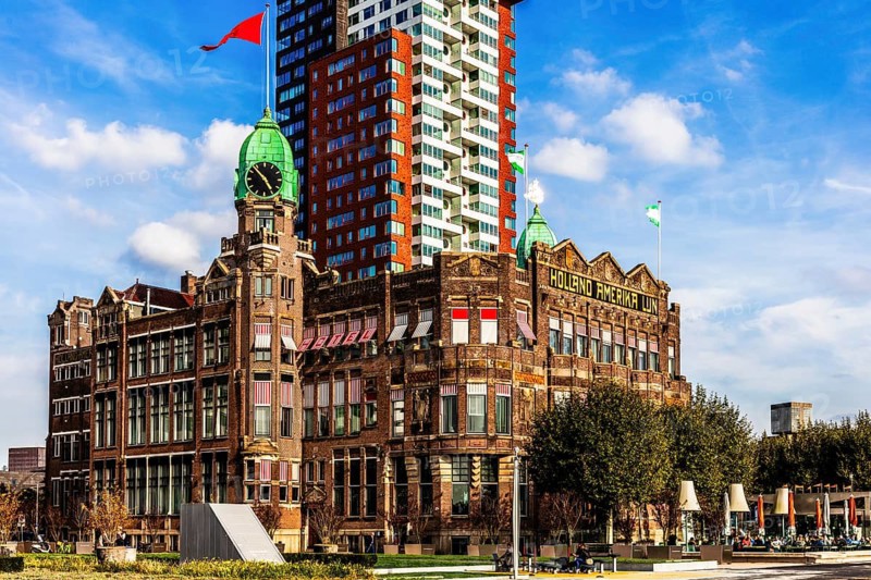 Hotel New York, historic art nouveau building on the Kop van Zuid, former headquarters of the Holland America Line, thousands of emigrants once left this place for North America, modern architecture in the city panorama, Rotterdam, Netherlands