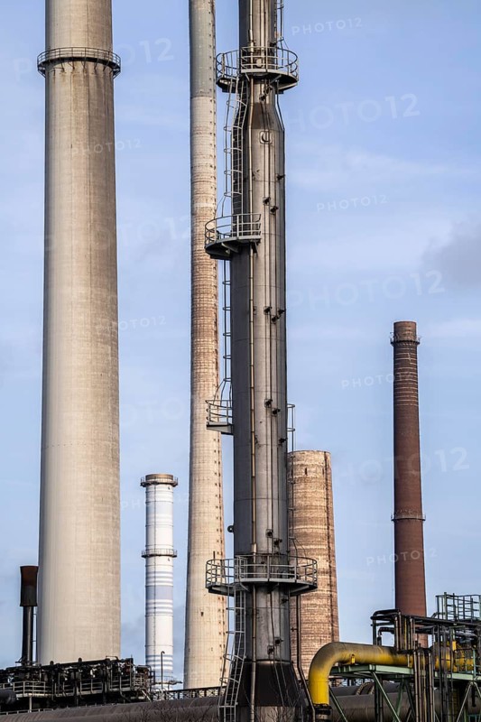 Chimneys of the Schwelgern coking plant and the sintering plant of the smelting works of Thyssenkrupp Steel Schwelgern Duisburg North Rhine-Westphalia, Germany