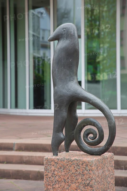 Tail Roller sculpture by Liesel Metten 1988, modern art, bronze sculpture, standing fantasy creature with round rolled tail, spiral-shaped, curious, Kaiserslautern, Rhineland-Palatinate, Germany