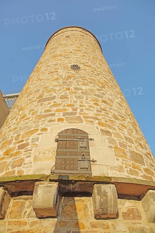 Round Drusel Tower built in 1774 with wooden door and fittings, part of the former historic city fortifications, view upwards, Kassel, Hesse, Germany