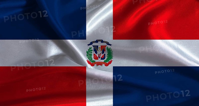 Dominican Republic flag with cloth textured background. National flag of Dominican Republic with realistic texture