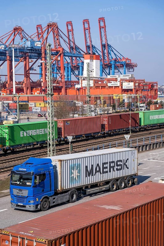 Port of Hamburg, Waltershofer Hafen, container ships, goods train with containers and container lorries bring and collect freight containers to and from HHLA Container Terminal Burchardkai, Hamburg, Germany