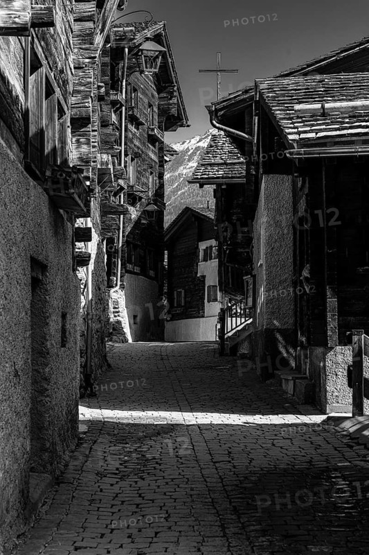 Old farmhouses in the Rue du Village, black and white photo, historic town center, Grimentz, Val d'Anniviers, Valais Alps, Canton of Valais, Switzerland
