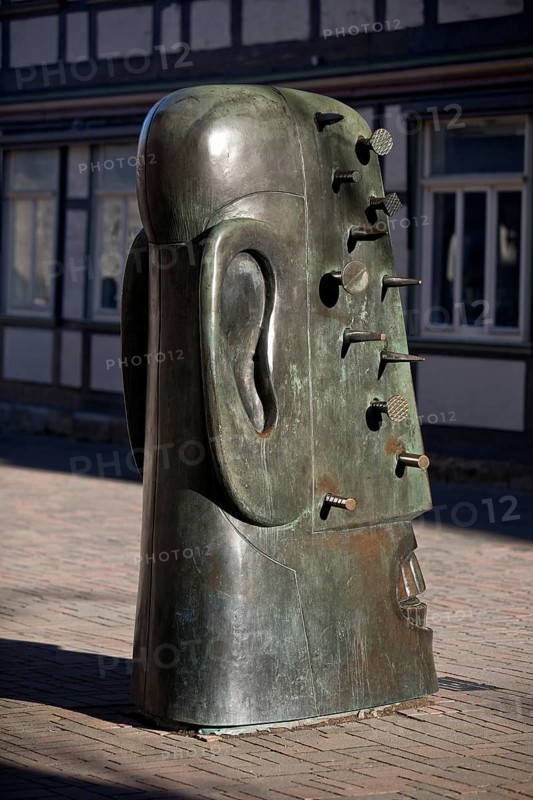 Bronze sculpture Goslarer Nagelkopf by Rainer Kriester at the town hall, Goslar, Lower Saxony, Germany