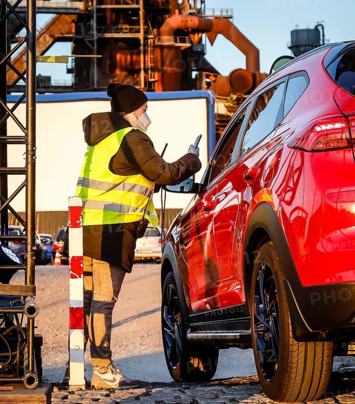 Dortmund, Ruhr area, North Rhine-Westphalia, Germany - drive-in cinema Dortmund, newly opened drive-in cinema in front of the former blast furnace plant Phönix-West in times of the Corona pandemic with contact ban, tickets are scanned digitally without contact