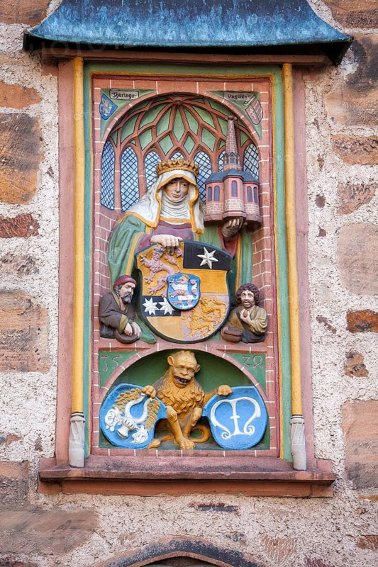 Relief image of St Elizabeth, Elizabeth of Hungary, 1207 - 1231, Renaissance Tower of the historic Town Hall, Marburg, Hesse, Germany, Europe, Reliefbild der hl. Elisabeth, Elisabeth von Thüringen, 1207 - 1231, Renaissance-Turm am historischen Rathaus, Marburg, Hessen, Deutschland, Europa