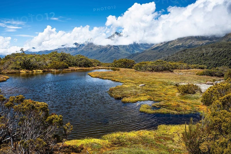 Mountain landscape with lake on the Key Summit Track hiking trail. Fiordland National Park, Southland Region, South Island, New Zealand
