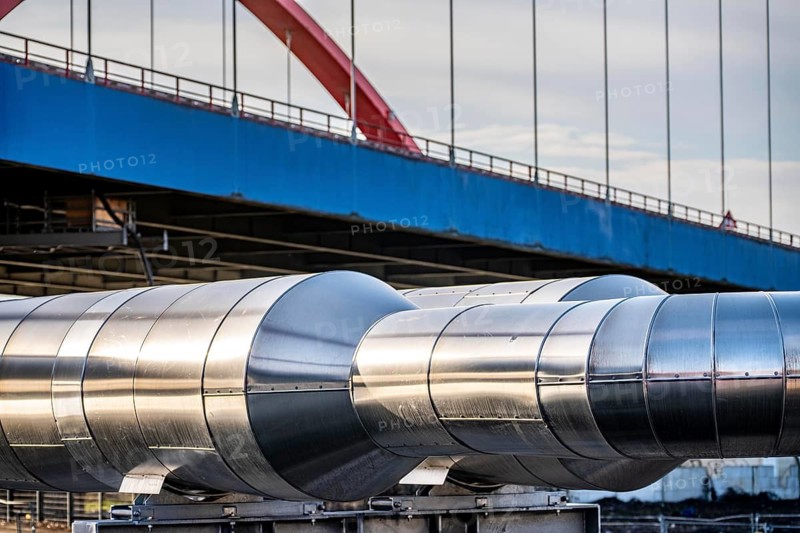 Iqony district heating pipes at the city port, crosses the Rhine-Herne Canal in Essen, A42 motorway bridge, North Rhine-Westphalia, Germany