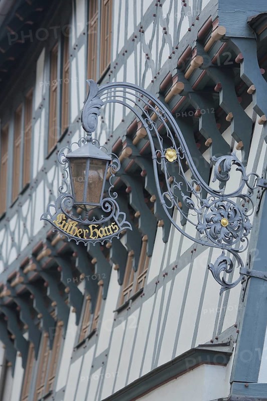 Nose sign with lantern from Luther House, home of Martin Luther, inscription, half-timbered house, Eisenach, Thuringia, Germany