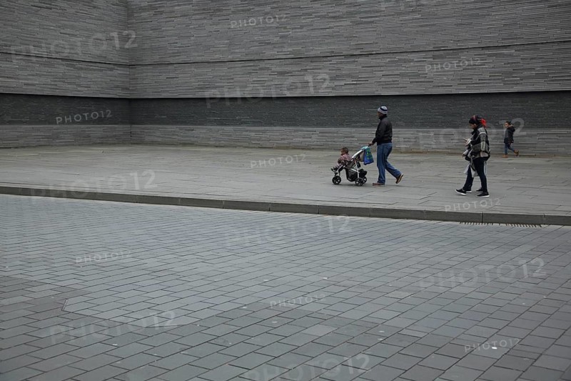 Namely commemoration of the persecution of Jews during National Socialism, pedestrians, gray wall with name, monochrome, NS era, deportation of Jews, Michelsberg Memorial, Wiesbaden, Rheingau, Hesse, Germany