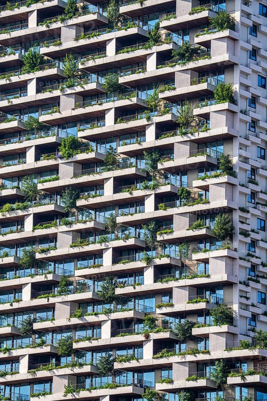 Wonderwoods residential tower, one of 2 green buildings, in Utrecht in the new Healthy Urban Quarter, at the central station, 105 metres high with 30 floors, Tower II, over 360 trees and over 9600 shrubs and flowering plants native to the region, all irrigated with collected rainwater, sponge city principle and monitored with sensors, Utrecht, Netherlands