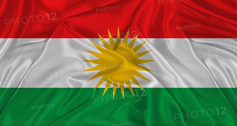 Kurdish flag with fabric texture. Realistic flag of Kurdistan waving, National flag