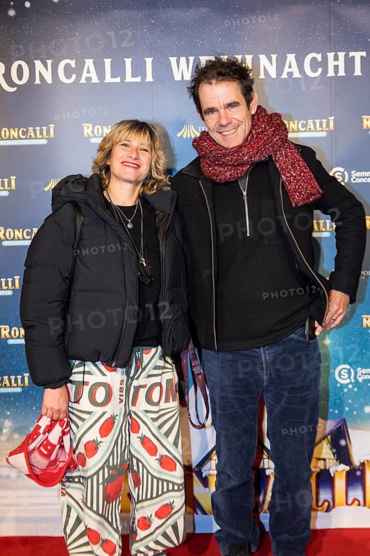 Marie Steinmann and Tom Tykwer at the premiere of the 20th Original Roncalli Weihnachtscircus in Berlin's Tempodrom on 20 December 2024