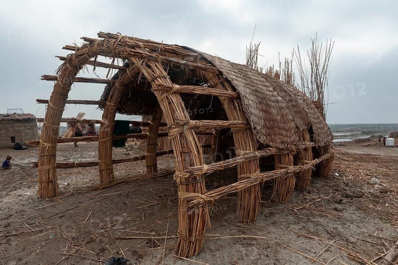 Al Chibayish, Iraq. November 6th 2018 Tradition Iraqi reed house under construction, known as a Mudhif and built from natural materials they have been used since the time of the Sumerians in Southern Iraq