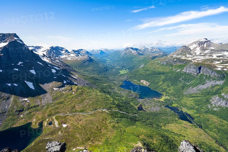 View from the summit of Innerdalstårnet of mountainous landscape, Innerdalen high valley and lake Innerdalsvatna, Trollheimen Mountain Area, Sunndal, Møre og Romsda, Vestlandet, Norway