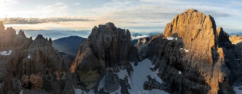 Impressive mountain peaks of the Brenta Mountains, sunrise, 360 degree alpine panorama, aerial view, Brenta, Brenta-Adamello Natural Park, Trentino, Italy
