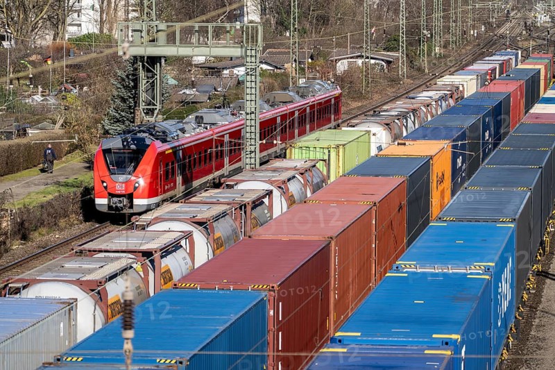 Local trains on the line, container trains in the freight yard, so-called installation tracks in Duisburg-Rheinhausen, freight trains are parked here at short notice in front of continuing their journey, either to the trimodal terminal in Logport Duisburg or from there to distant destinations, such as China, as part of the new Silk Road, North Rhine-Westphalia, Germany