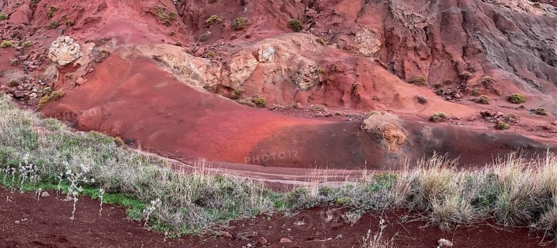 Volcanic soil, colorful soil, red, erosion, near Miradouro da Ponta do Rosto, Madeira, Portugal
