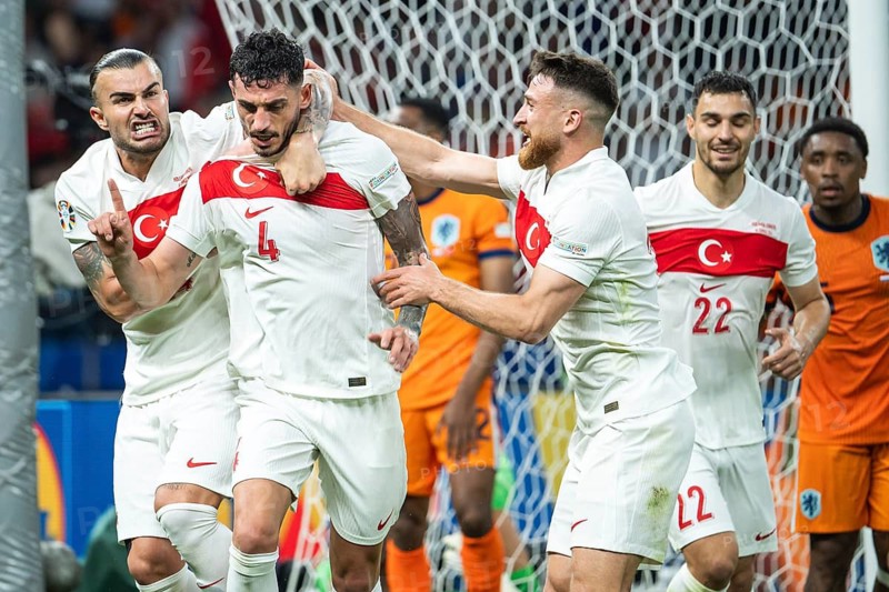 BERLIN, GERMANY - JULY 6, 2024: Euro 2024 quarterfinal match Nederlands vs Turkey (Turkiye) 2:1. Abdulkerim Bardakci (L) Samet Akaydin (R) joy after scoring goal.