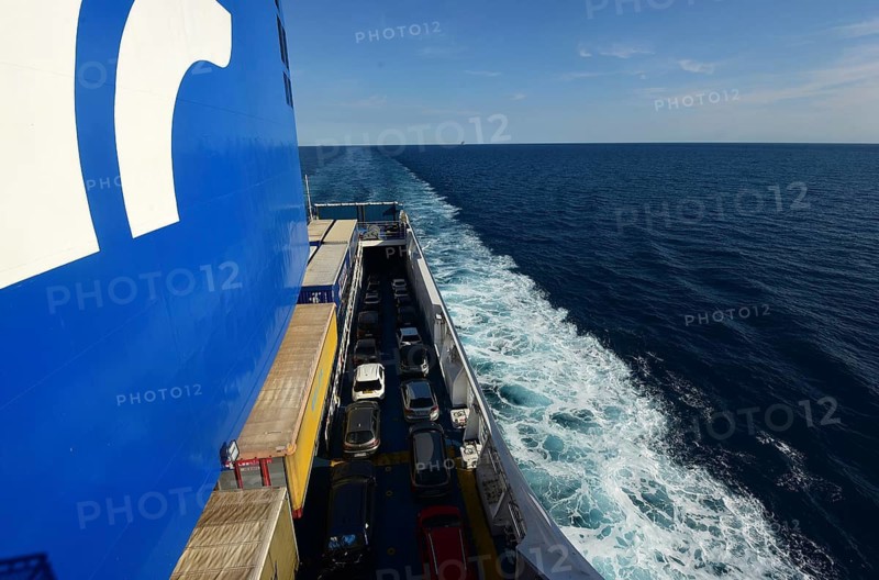 A car ferry of the GNV shipping company on its way from Palermo / Sicily shortly in front of entering the harbour of Genoa. Lorry trailers and cars can be seen on board