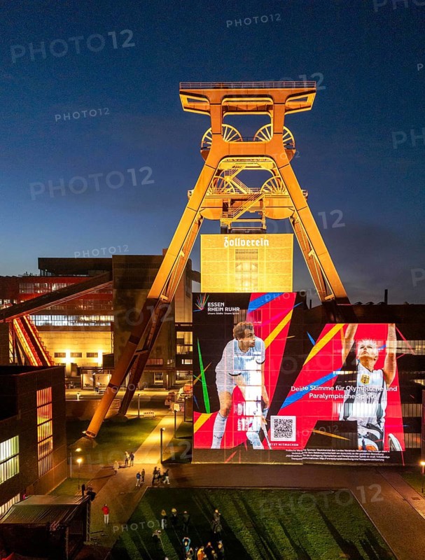 Advertising for participation in the referendum on the Olympic bid of North Rhine-Westphalia, with the Rhine-Ruhr region, Cologne-RheinRuhr, interactive light installations can now be seen at 5 different well-known sights, which are aimed at the citizens of the affected cities and regions to take part in the vote, here the Doppelbock conveyor framework of shaft 12, at the Zollverein colliery in Essen
