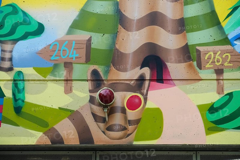 Graffiti, spray art, colorful pictures, public art, mythical creatures, fantastic creatures, human and animal beings, cat, eyes, numbers, artistically designed entrance to the underground car park, concrete wall, Orschel-Hagen, district of Reutlingen, Baden-Württemberg, Germany