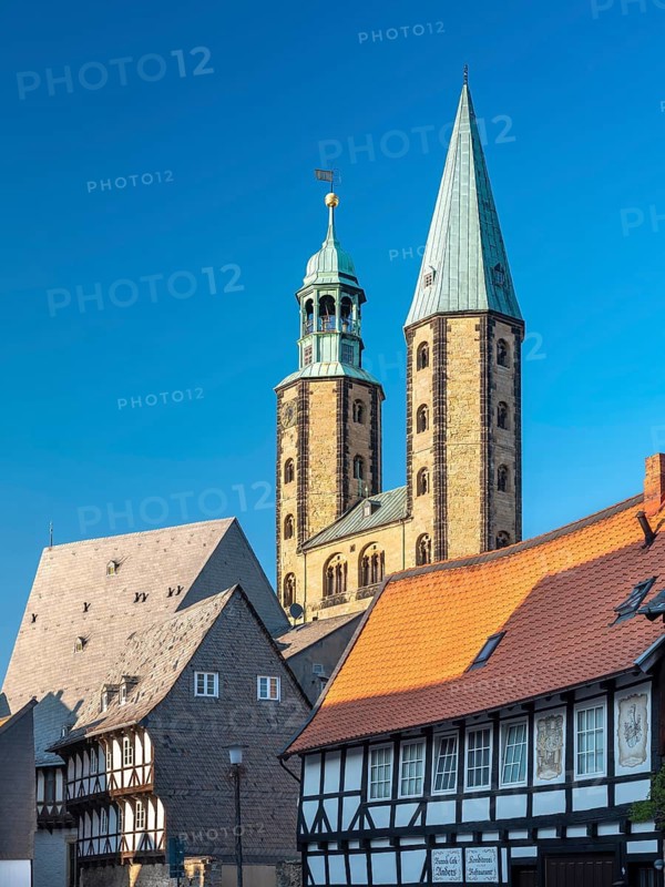 The towers of the market church above the half-timbered houses in the historic old town, Goslar, Harz, Lower Saxony, Germany