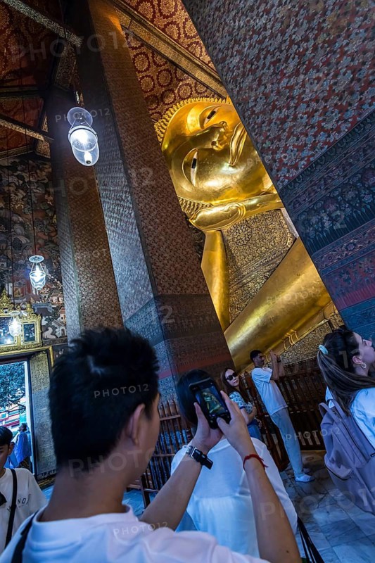Wat Pho, temple of the reclining Buddha. Sightseeing attraction, architecturally significant temple complex. It is home to Phra Buddhasaiyas. The gilded Buddha statue is 46 metres long and 15 metres high. Bangkok, Thailand