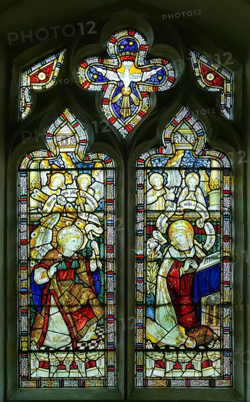 Stained glass window of Annunciation by Charles Eamer Kempe, church of Saint Botolph, Burgh, Suffolk, England, UK c 1902, Gabriel and Mary