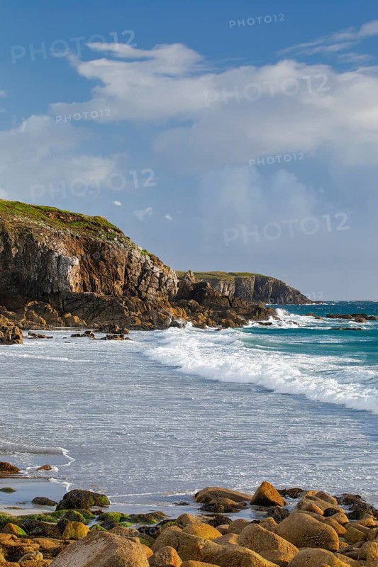 Waves breaking on the rocky coast near Plouarzel on the Atlantic coast, Département Finistère, Brittany, France