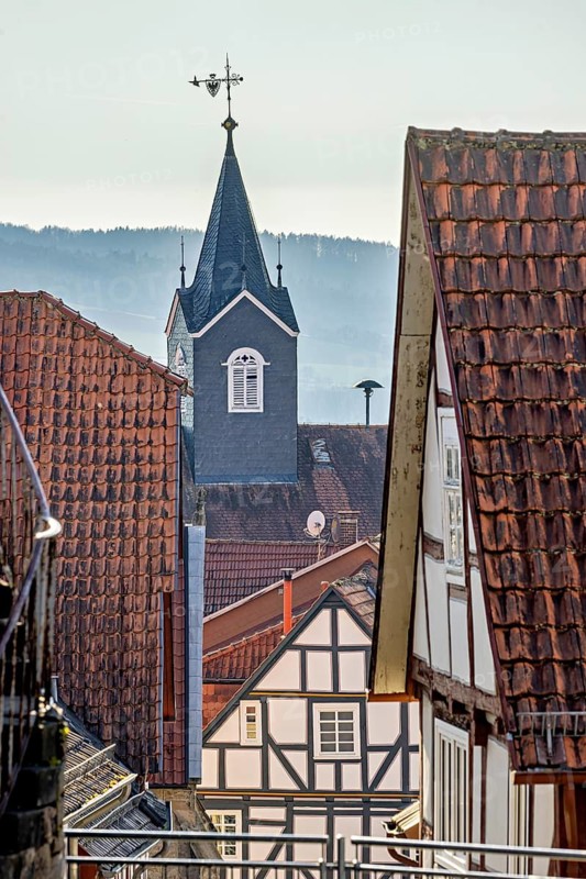 Picturesque old town with half-timbered houses and church tower, rustic atmosphere, church tower of the town of Spangenberg